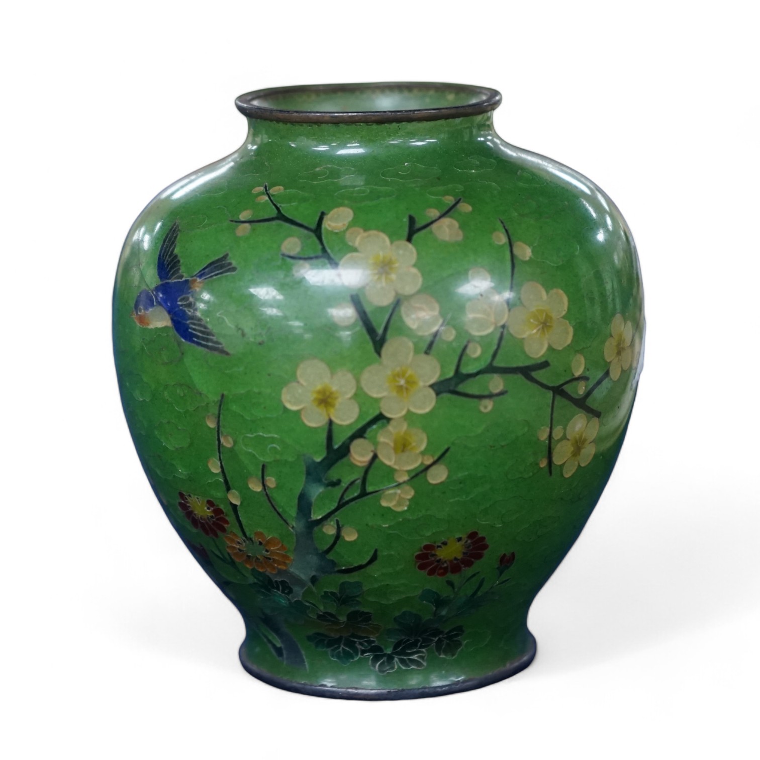 A Japanese silver wire plique a jour enamel green ground vase, early 20th century, 8.5cm. Condition - large cracks to body otherwise reasonable